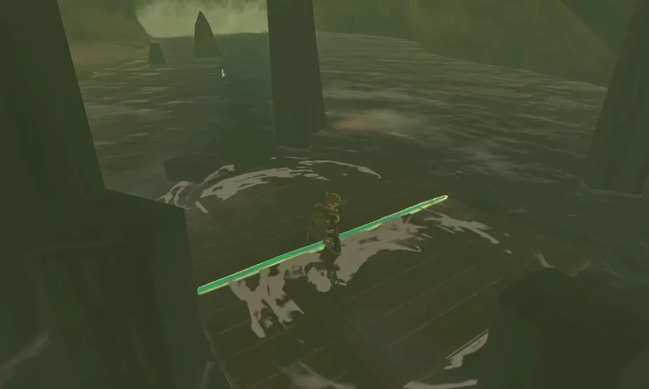 Link on a crfated wooden raft right under the tower.