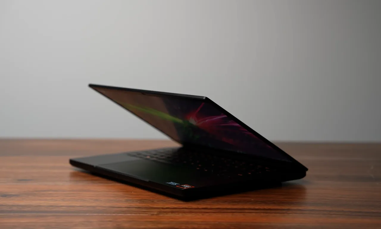 Razer Blade 14 (2024) from side front angle with half lit open