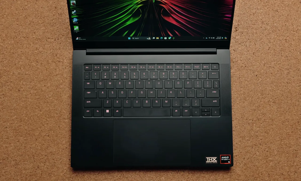 Razer Blade 14 from top front showing wide space keys and touchpad.
