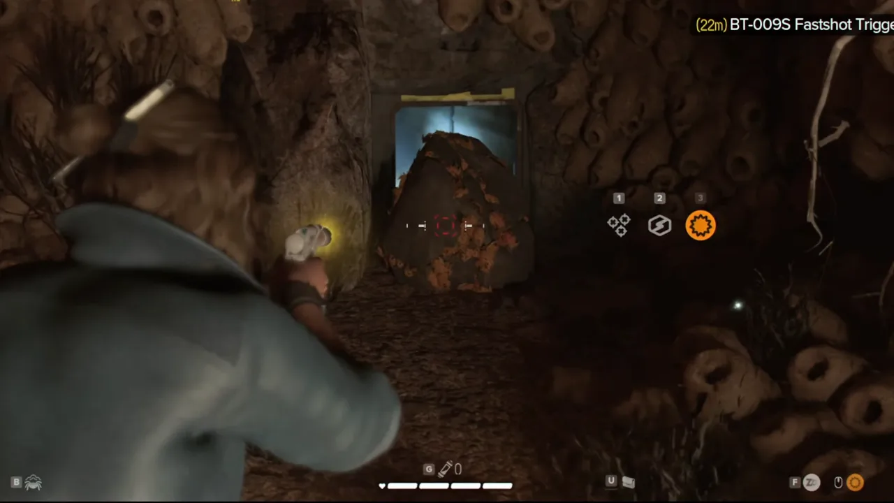 Star Wars Outlaws screenshot showing Kay Vess destroying rock with Blaster in Flyer Ridge cavern to make way through tunnel to get to BT-009s Fastshot Trigger location.